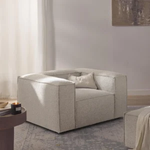 The Lennon Armchair in Corduroy-6 is a statement piece that blends contemporary minimalism with cozy sophistication