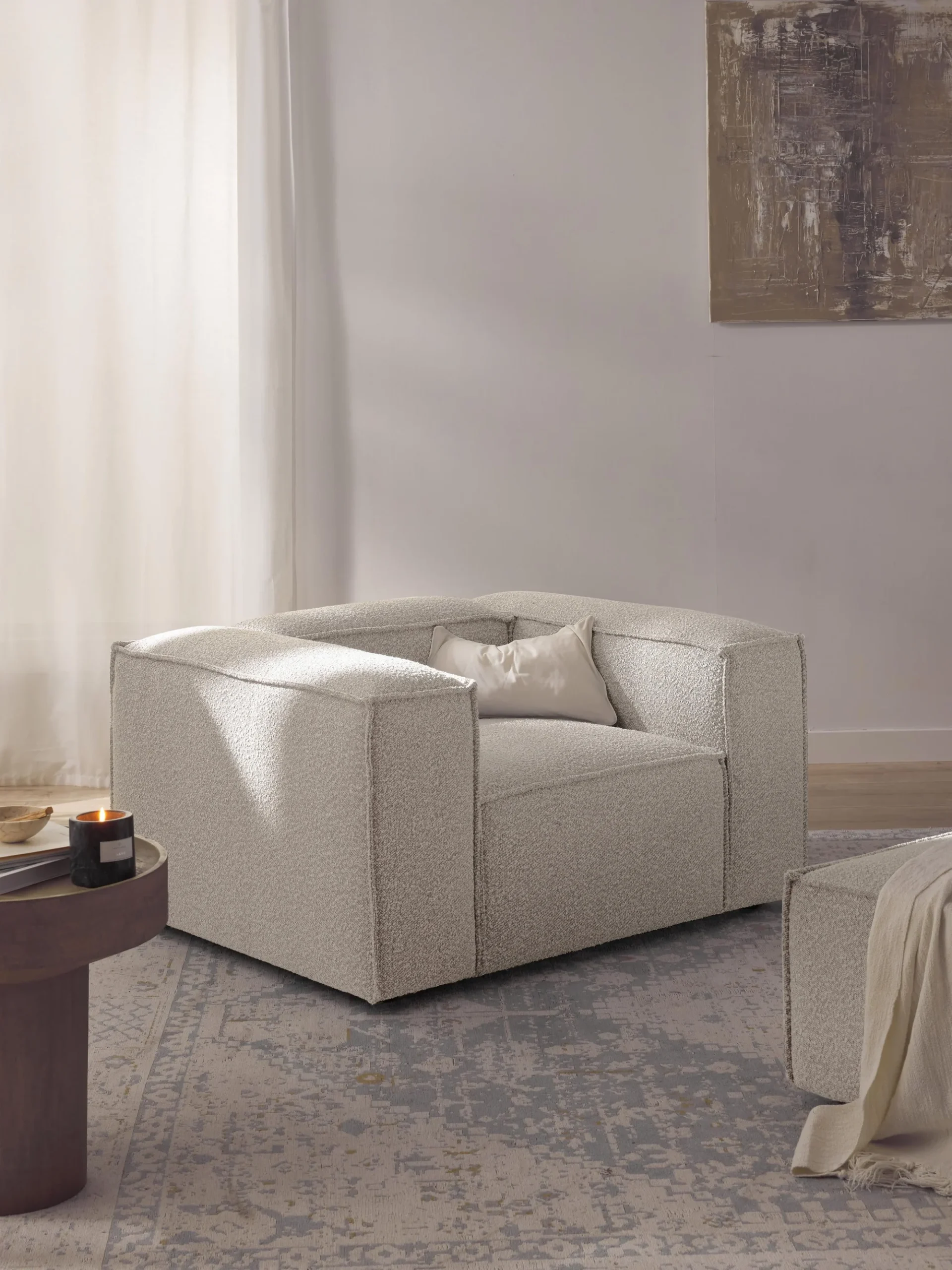 The Lennon Armchair in Corduroy-6 is a statement piece that blends contemporary minimalism with cozy sophistication