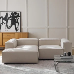 The LANA console not only offers additional storage space but is also a decorative highlight that fits the LENNON dimensions perfectly. The LENNON ottoman with a wooden top can be used either as a coffee table or as a connecting element for the sofa—for a stylish look, storage, and practical use.