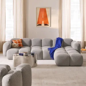 TAYLA modular bouclé sofa, 4-seater, with bubble-inspired upholstery, soft backrests, and flexible ottoman placement (left, right, or freestanding). Crafted in the UAE.