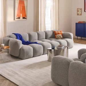 TAYLA – Modular 4-seater bouclé sofa, crafted with bubble-inspired elegance and soft backrests for ultimate comfort. A modern centerpiece that adapts to your living space with flexible modular design