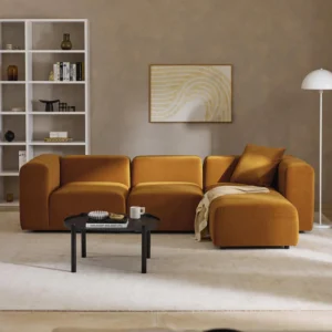 LENA – Modular 4-seater velvet sofa with stool, extra-deep seating, and flowing lines. Flexible design crafted in the UAE for modern comfort and timeless style.