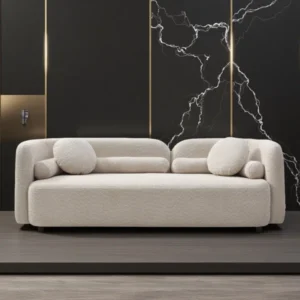Avelora 225 cm curved bouclé sofa in beige with rounded arms, plush deep cushions, and four accent pillows styled in a modern living room.