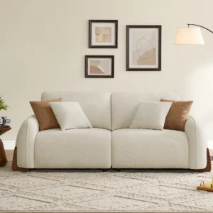 Ardena 230 cm upholstered modular sofa in sand polyester with birch wood legs, reversible cushions, and four accent pillows