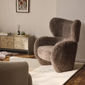 Teyvat bouclé armchair with organic shape, high backrest, and soft textured upholstery