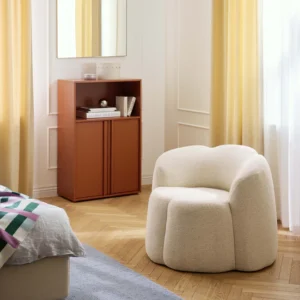 Creamy white bouclé upholstered FLEUR chair with curved floral-inspired design and solid wood frame