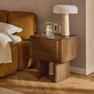 Chandler bedside table made of oak with angular design, soft curves, and one push-to-open drawer for a minimalist look