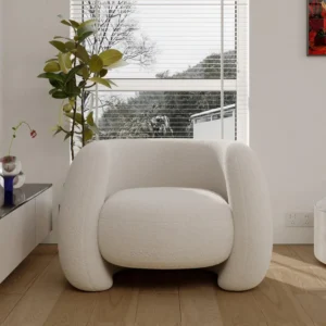 Curved armchair with Japanese minimalist design and contemporary curved silhouette, crafted for comfort and style