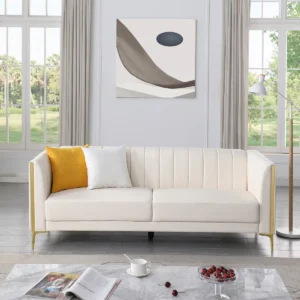 Dreiling Luxe Channel-Tufted Sofa in faux leather with tuxedo arms, vertical channel tufting, gold metal legs, and two accent pillows