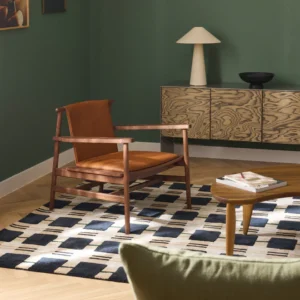 Hayo armchair made of ash wood with leather seat and backrest, designed for comfort and elegance