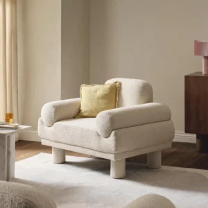 LILO sofa with rounded upholstery rolls and block-inspired legs, showcasing a voluminous, contemporary design for modern interiors.
