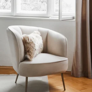 Cream white velvet upholstered furniture with gold brushed metal legs and soft plush finish