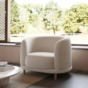Lounge armchair with ergonomic design, solid wood frame, and minimalist style, ideal for modern living rooms or reading nooks