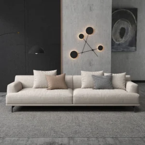 Gray tufted 2-seater sofa with cotton-linen upholstery, recessed arms, and black legs in a modern living room setting.