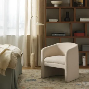 Mairo bouclé lounge chair with soft textured upholstery and elegant armrests, available in armchair and lounge chair versions