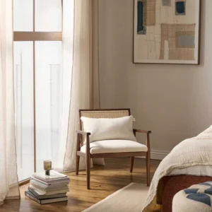 Manual lounge chair made of solid rubberwood with Viennese wickerwork, retro-inspired design, and natural finish