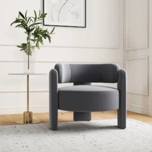 Modern velvet accent armchair with rounded design, plush cushioning, and solid wood base in minimalist style