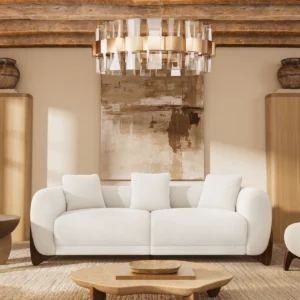 Beige teddy sherpa upholstered 3-seater sofa with rounded arms and wooden wedge legs in a modern living room.