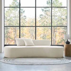 Modern armless compression foam sofa with minimalist design, plush seating, and two matching pillows.