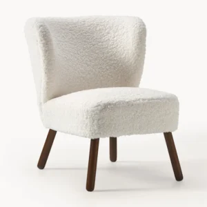 Robine teddy cocktail armchair with soft fabric upholstery, designed in countryside style with a modern twist.