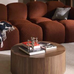Round wooden coffee table DAN with minimalist brutalist-inspired design, available in multiple sizes for modern interiors