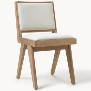 SISSI wooden chair with upholstered seat and back, inspired by Pierre Jeanneret’s 1950s design, blending modern craftsmanship with timeless elegance.