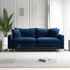 Modern velvet 4-seater sofa with square arms, plush cushions, and gold or chrome legs in a stylish living room setting