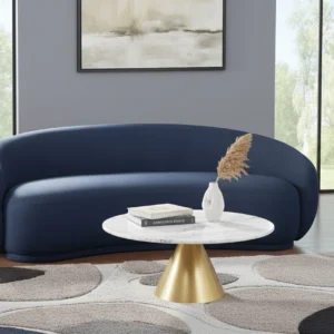 Curved velvet sofa with plush cushioning and modern armless design in a contemporary living room setting.