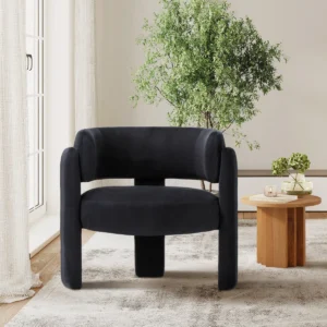 Veyra modern three-leg accent chair with metal frame, upholstered in premium fabric, featuring spacious seat and padded arms for comfort and style