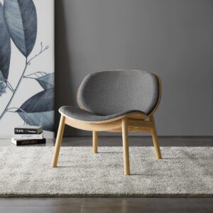 Danica Accent Chair by Greenington, crafted from sustainably sourced solid bamboo with a caramelized wheat finish, featuring a sweeping angled seat, circular backrest upholstered in finely woven fabric, and elegantly sloped legs