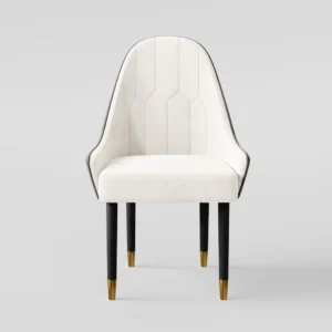 Velvet upholstered dining chair with golden accents, sleek silhouette, and refined Art Deco-inspired design