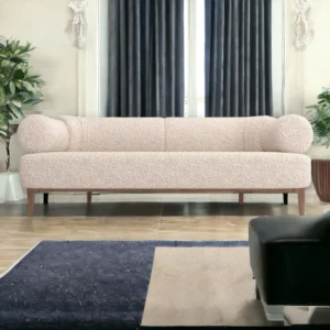 Front view of Nismaaya Badru 3 Seater Fabric Sofa with sleek premium fabric upholstery, plush cushions, sturdy wooden frame, and stylish metal legs, designed for modern luxury and comfort.