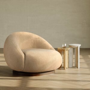 Cozy swivel lounge chair upholstered in textured boucle with soft curved silhouette, solid hardwood base, and dark Porto lacquer finish
