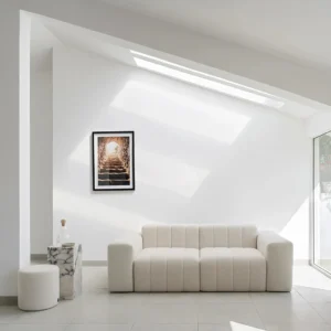 Klein Sofa with curved armrests, detailed stitching, and deep cushioned seating upholstered in plush fabric, styled for modern and classic living spaces.
