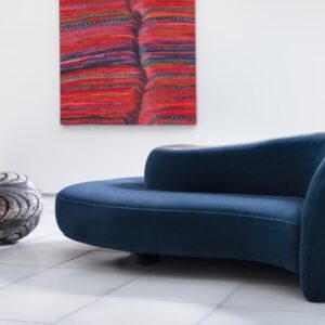 Vladimir Kagan Park Avenue Sofa with back-to-back curvaceous design, recessed wood base, and customizable decorative inset.