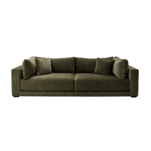 Benito Sofa with low profile, wide armrests, deep cushioned seating, and plush upholstery, styled as a modern centerpiece in a contemporary living space
