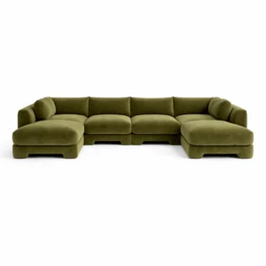 Marjorie U-Shape Sofa with low sculptural silhouette, rounded arm bolsters, and deep cushioned seating upholstered in premium fabric, styled for modern living spaces.