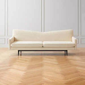 Three-seater sofa with teak wood frame and bouclé fabric upholstery, showcasing a modern yet cozy design