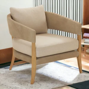 Modern upholstered armchair with ergonomic design, premium fabric upholstery, contoured seat and backrest, and supportive arms, ideal for living rooms or reading corners."